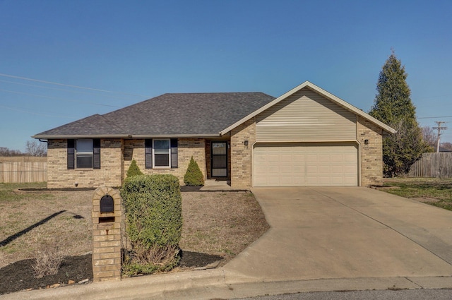 ranch-style house featuring brick siding, a shingled roof, fence, a garage, and driveway