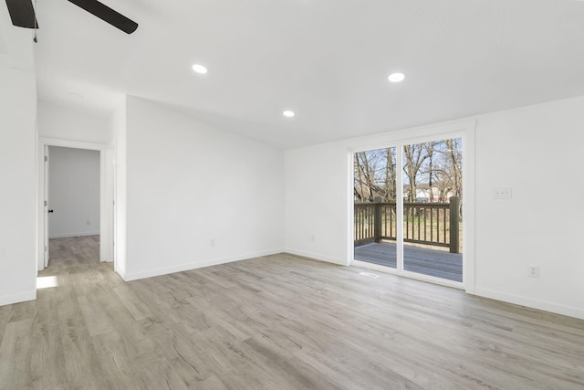 unfurnished room with light wood finished floors, recessed lighting, and baseboards