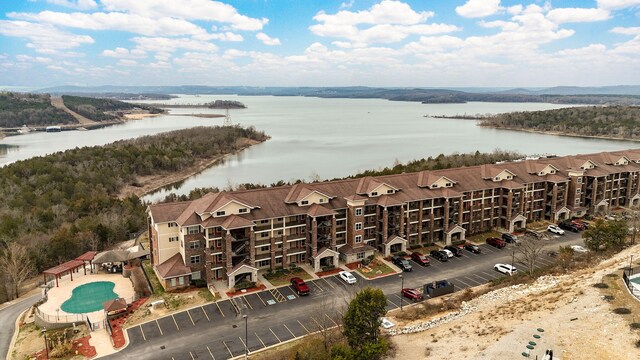 birds eye view of property featuring a water view