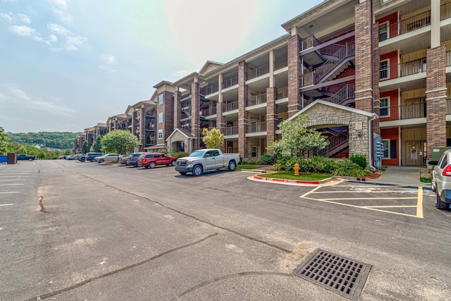 view of property with uncovered parking