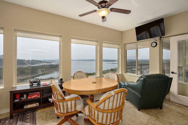 sunroom featuring tile patterned floors