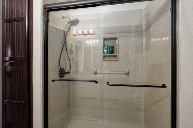 bathroom featuring a stall shower