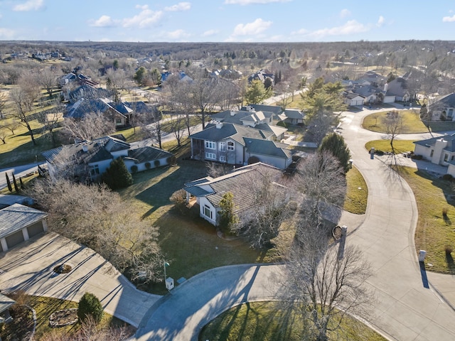 birds eye view of property with a residential view