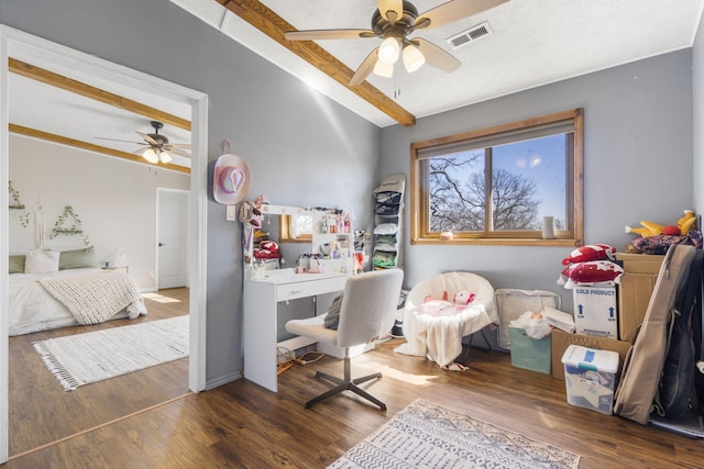 home office with visible vents, baseboards, wood finished floors, and a ceiling fan