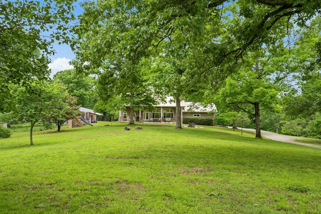 view of yard featuring a playground