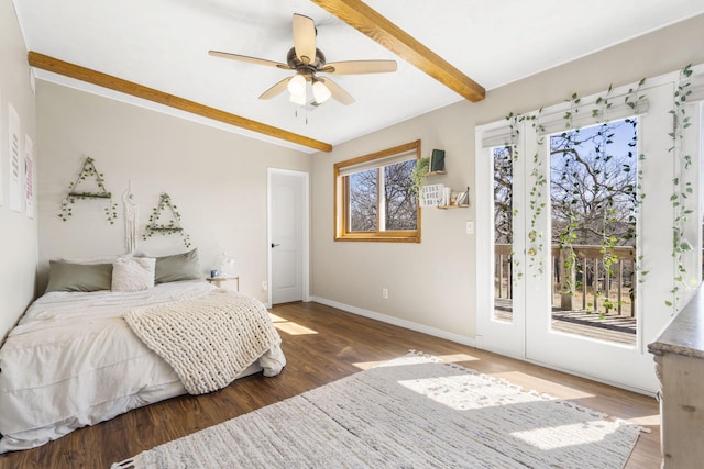 bedroom featuring beamed ceiling, a ceiling fan, wood finished floors, baseboards, and access to exterior