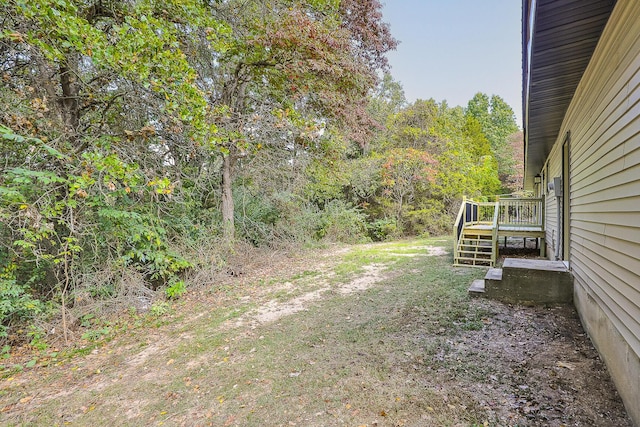 view of yard with a deck