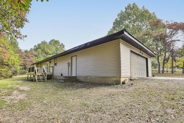 view of property exterior featuring a garage