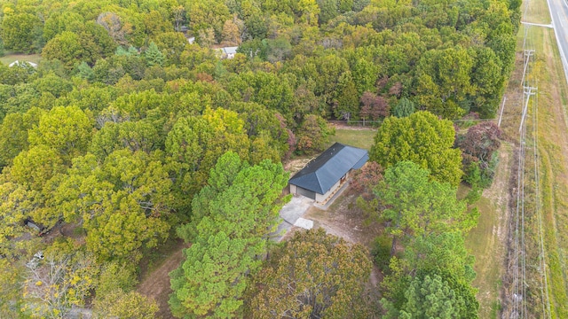 birds eye view of property with a wooded view