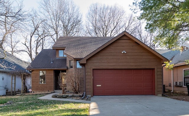 view of front facade featuring brick siding, a garage, driveway, and a shingled roof