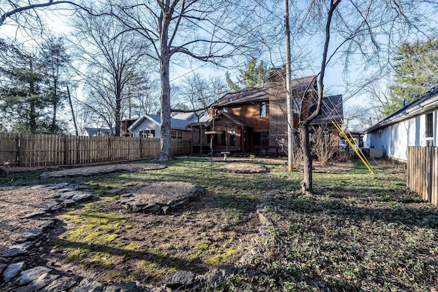 view of yard featuring fence