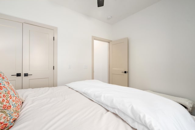 bedroom featuring a closet and ceiling fan