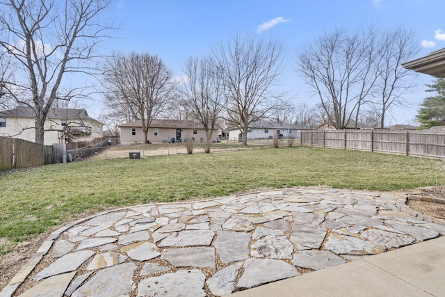 view of yard with a patio and a fenced backyard