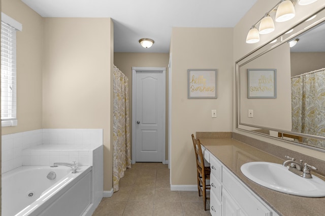 full bath with tile patterned floors, vanity, a bath, and baseboards