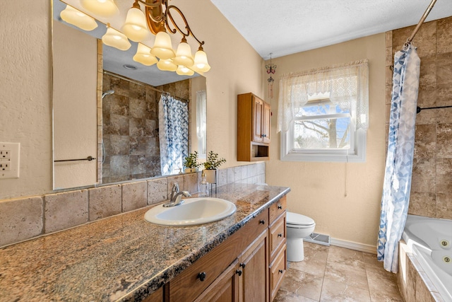 bathroom featuring vanity, visible vents, baseboards, decorative backsplash, and toilet