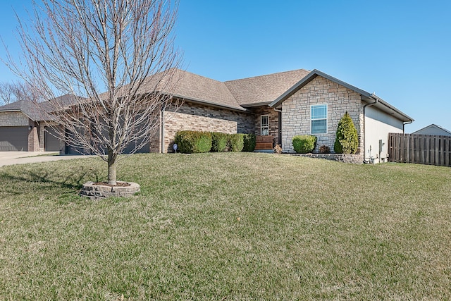 ranch-style house featuring a garage, concrete driveway, a front lawn, and fence