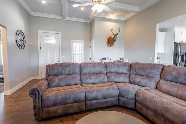 living area with dark wood finished floors, beamed ceiling, baseboards, and ornamental molding