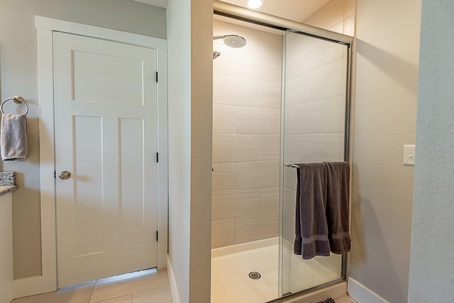 bathroom with a stall shower