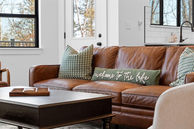 living area featuring plenty of natural light