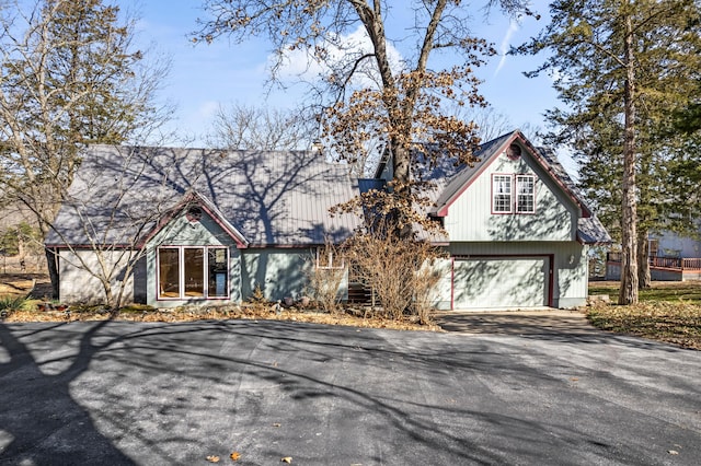 25906 Farm Rd Unit 1263, Golden, MO 65658 - view of front facade featuring aphalt driveway and an attached garage