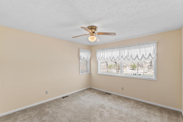 25906 Farm Rd Unit 1263, Golden, MO 65658 - unfurnished room featuring visible vents, carpet flooring, baseboards, and ceiling fan