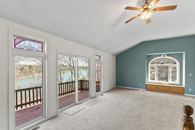 25906 Farm Rd Unit 1263, Golden, MO 65658 - unfurnished living room featuring lofted ceiling, carpet flooring, a ceiling fan, and baseboards
