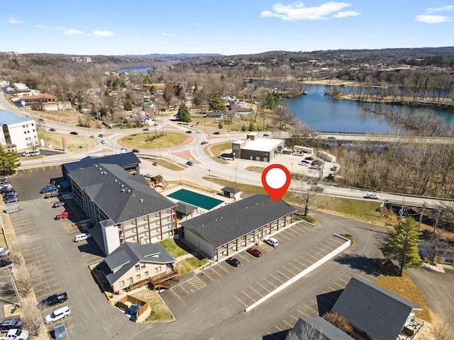 birds eye view of property featuring a water view