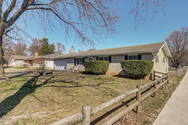 single story home featuring fence, a chimney, a front lawn, a garage, and stone siding