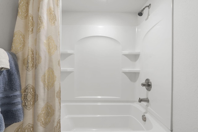 full bath with shower / bath combination with curtain