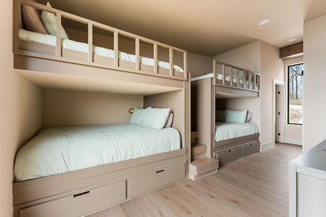 unfurnished bedroom with wood finished floors