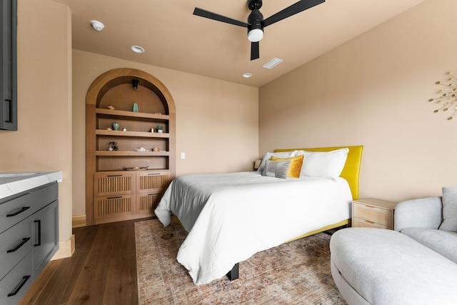 bedroom with visible vents, recessed lighting, dark wood-type flooring, and ceiling fan