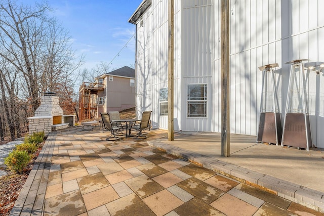 view of patio featuring outdoor dining area