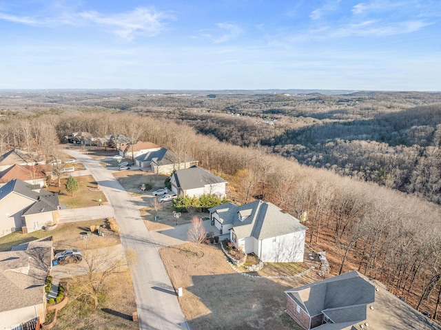 bird's eye view featuring a view of trees