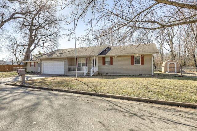 ranch-style home with fence, driveway, a porch, a garage, and crawl space