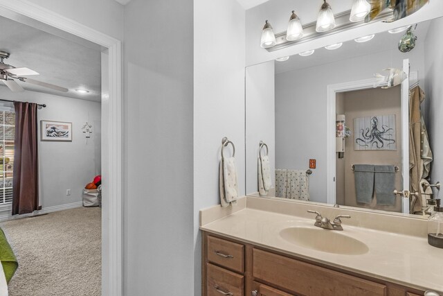 bathroom featuring vanity and a ceiling fan