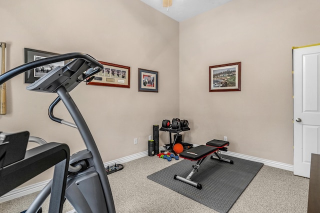 exercise area with carpet and baseboards