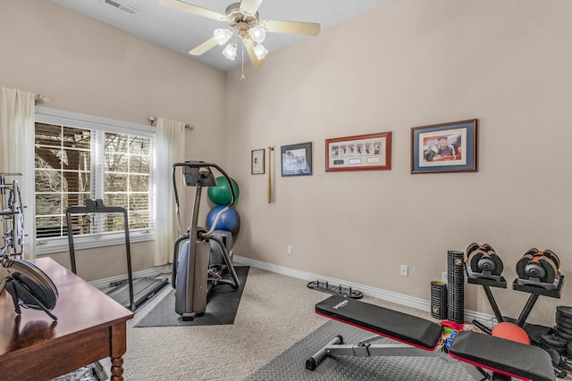 exercise room featuring a ceiling fan, visible vents, carpet, and baseboards