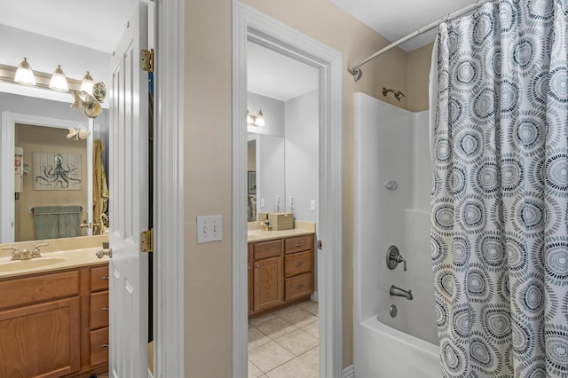 full bath featuring shower / bath combination with curtain, vanity, and tile patterned flooring