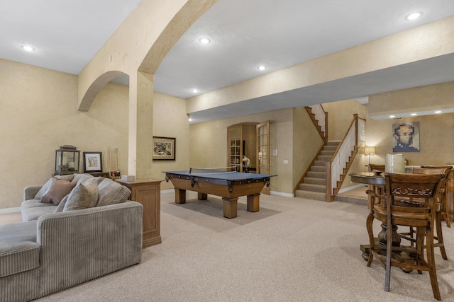 rec room featuring recessed lighting, light carpet, arched walkways, and pool table