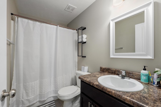 bathroom featuring visible vents, toilet, curtained shower, and vanity