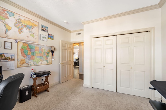 home office with visible vents, baseboards, carpet flooring, and crown molding