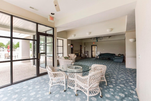 dining room featuring visible vents and carpet flooring