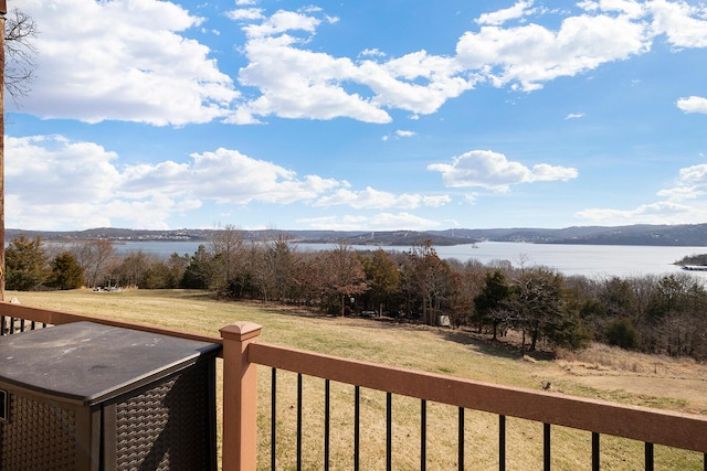 deck featuring a water view