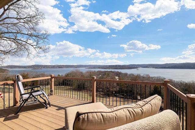 deck featuring a water view