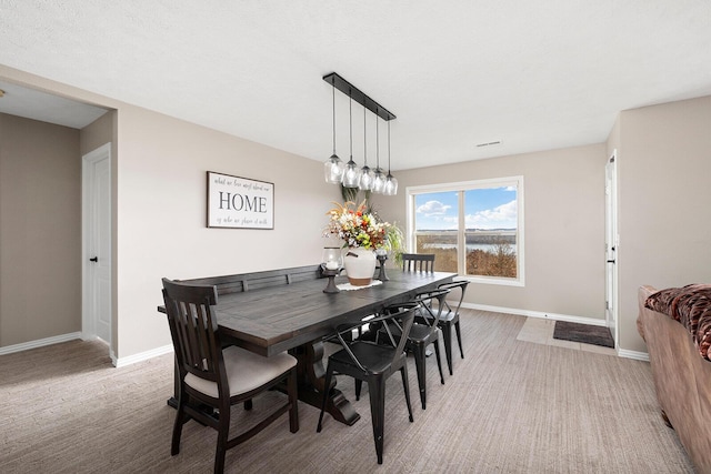 dining space with baseboards