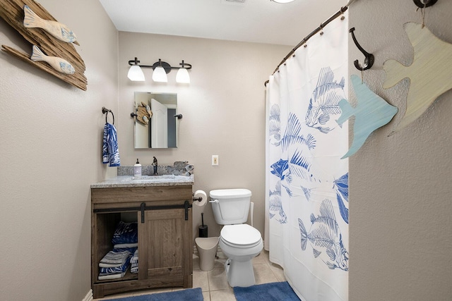 full bath featuring vanity, tile patterned floors, curtained shower, and toilet