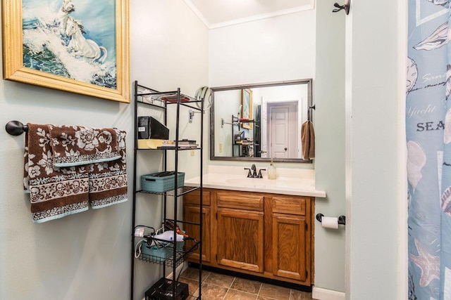 bathroom featuring tile patterned floors, curtained shower, vanity, and ornamental molding