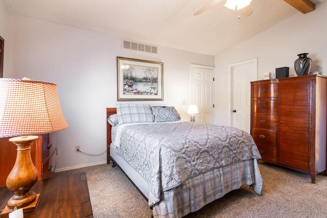 carpeted bedroom featuring a ceiling fan, vaulted ceiling, baseboards, and visible vents