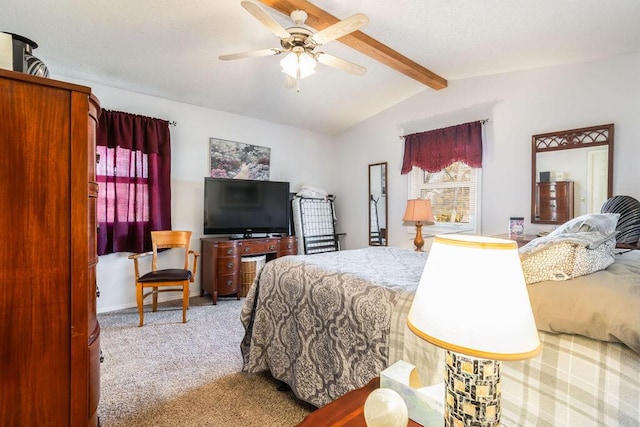 bedroom with baseboards, vaulted ceiling with beams, ceiling fan, and carpet flooring