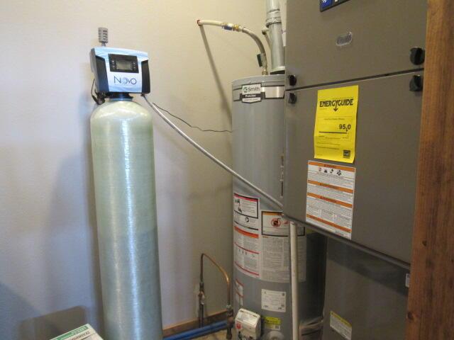 utilities featuring heating unit and water heater